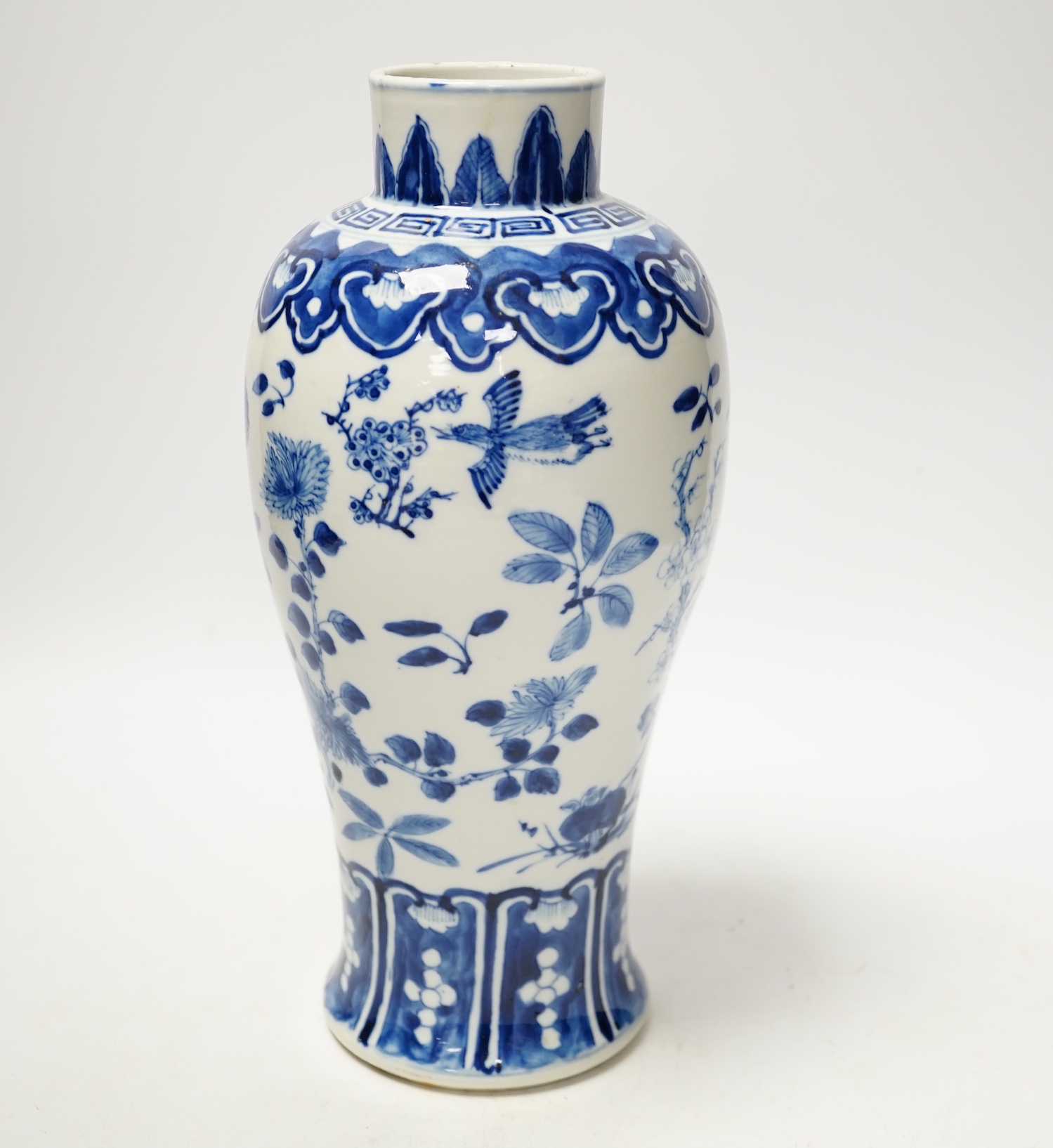 A Chinese blue and white baluster vase decorated with birds and flowers, late 19th century, 27cm high